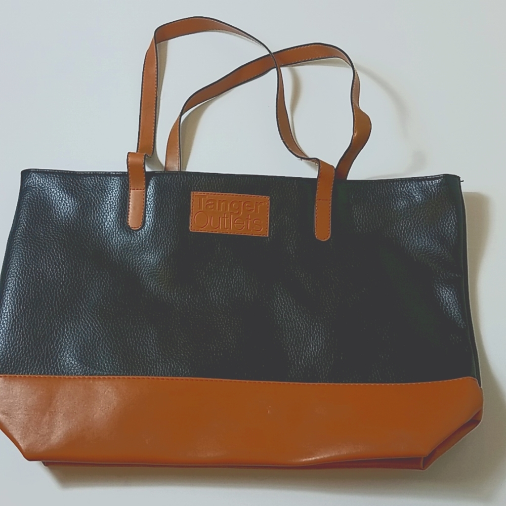 Tanger outlets black and brown faux leather shoulder bag